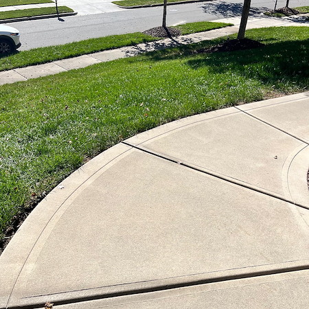 Top 5 Benefits of Pressure Washing Your Driveway and Sidewalks This Summer